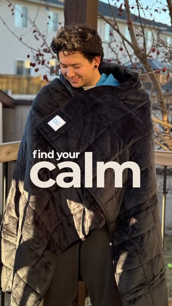 This image ad features a person standing outside on a porch wearing a weighted blanket. Text overlay encourages viewers 
