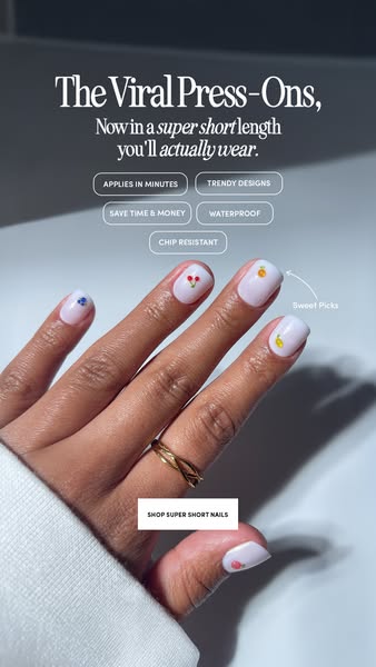 The image ad promotes press-on nails that are super short. The ad highlights that the press-on nails apply in minutes, a