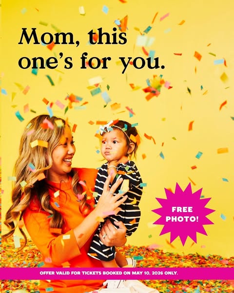 This image ad celebrates mothers by offering a free photo. It features a bright, cheerful image of a mother holding her 