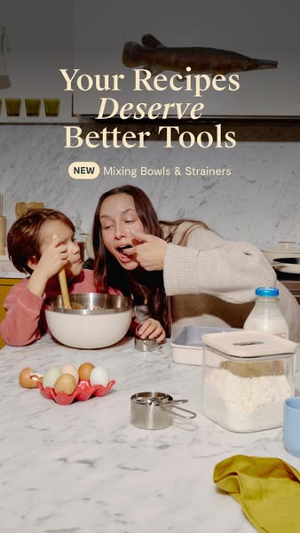 This image ad features a mother and child baking, highlighting the brand's new line of mixing bowls and strainers. T