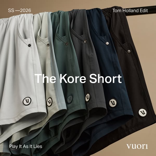 This ad showcases Vuori's Kore Short, highlighting its availability in multiple colors and its association with Tom 