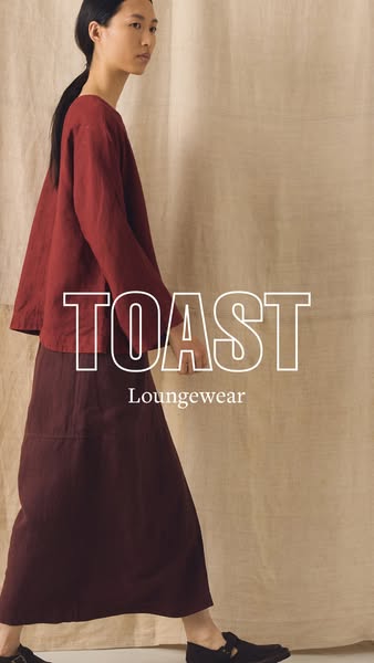 The ad showcases Toast brand loungewear, featuring a woman in a long skirt and top, with the focus on the comfort and st