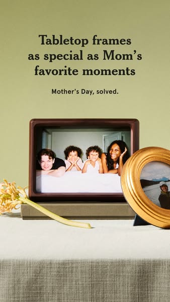 An ad showcasing tabletop picture frames as a potential Mother's Day gift. It features two frames with family photos
