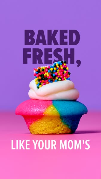 This image ad features a colorful cupcake against a two-tone background, with text highlighting its fresh, homemade qual
