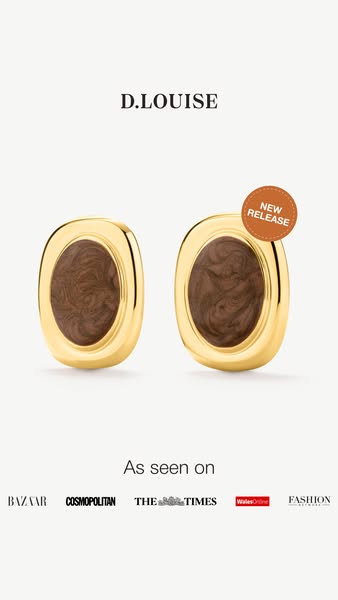 An image ad for D.Louise earrings. Two earrings are displayed against a white background, below the brand name and above