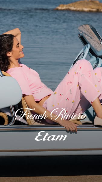 This ad for Etam features a woman lounging in a light blue convertible by the water while wearing pink pajamas with a ch