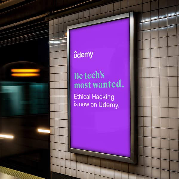 This ad shows a large purple Udemy billboard ad in a subway station next to a moving train. The ad indicates you can lea