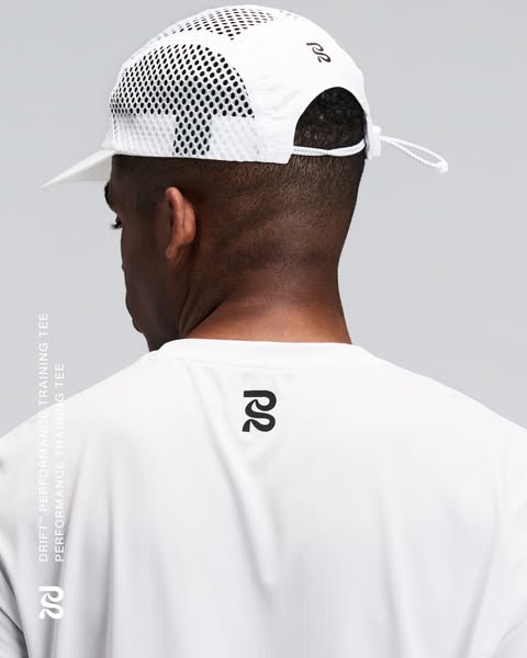 This ad showcases a Drift Performance Training Tee and related apparel. A man is shown wearing the tee and a matching wh