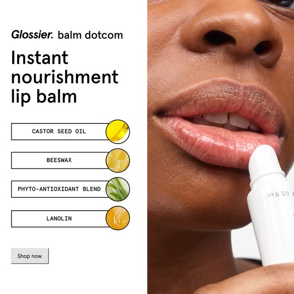 The ad promotes Glossier's Balm Dotcom. The image highlights the nourishing lip balm while showing off the natural i