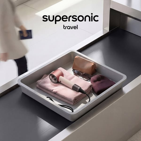 This ad features a Dyson Supersonic hairdryer in a TSA security tray to highlight its travel-friendly size and versatili