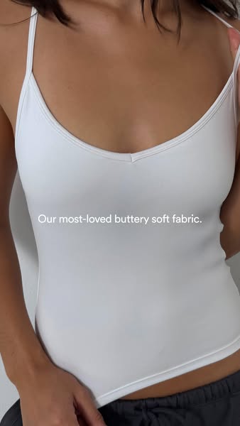 This image ad showcases the 'buttery soft fabric' of a camisole.