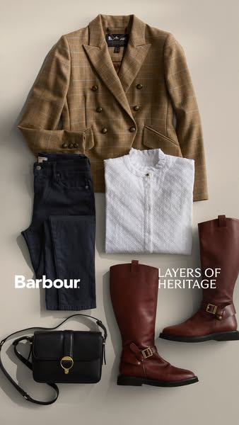 The ad features a flat lay of Barbour clothing and accessories to showcase the brand's heritage.