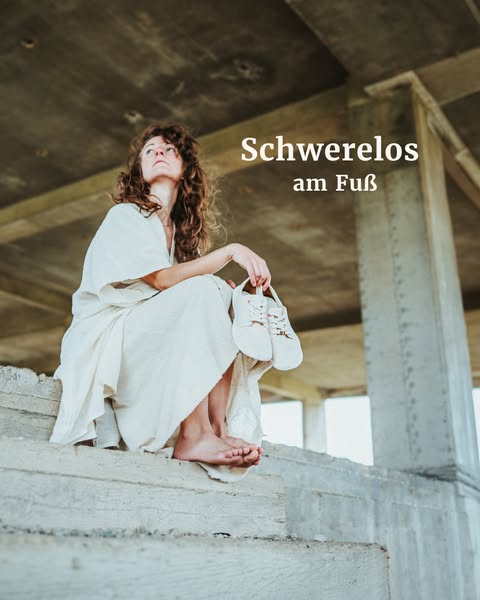 This ad shows a barefoot woman holding a pair of white shoes, implying the feeling of lightness and freedom one gets whi
