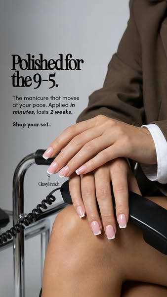 This ad for Classy French features a woman in a business suit with her hands on a phone. Her nails have a white tip mani
