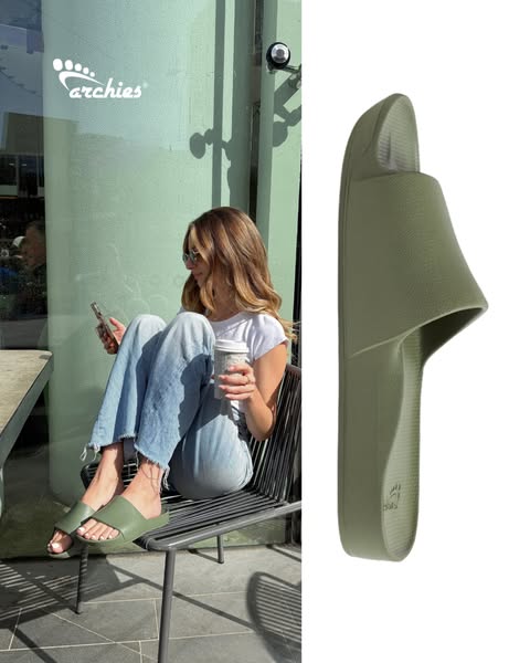 This ad features a woman wearing a pair of Archies slides while sitting outside, holding a coffee and using her phone. N