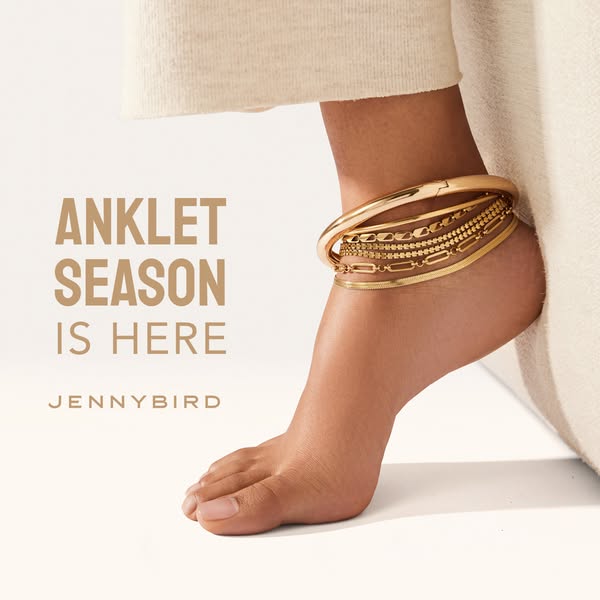 This ad from Jennybird features an image of a dark-skinned female ankle wearing multiple gold anklets. The ad is trying 