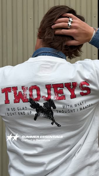 This ad features a person from the back wearing a white Twojeys t-shirt with an image of a horse. The text and image are