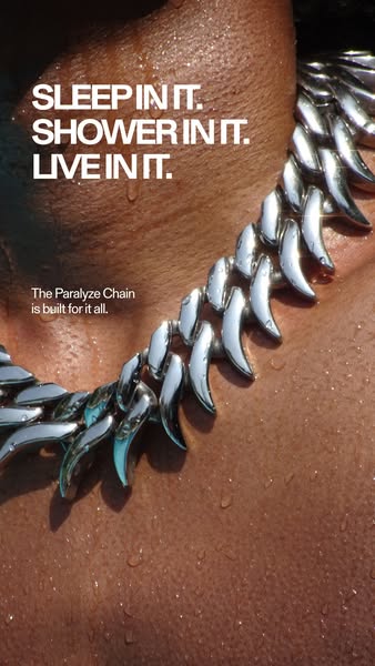 An ad for the Paralyze Chain necklace featuring a close-up of the necklace being worn and text promoting the product'