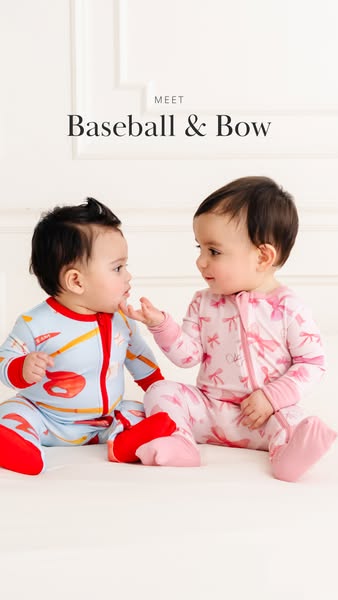 This ad features two babies wearing two different styles of footed pajamas from the Baseball & Bow collection. The p
