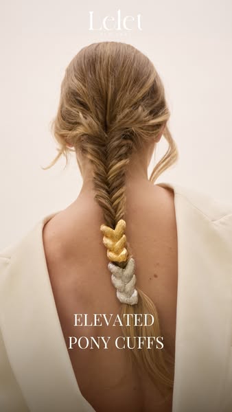 This image ad showcases the Lelet NY Elevated Pony Cuffs, positioned on a blonde fishtail braid.