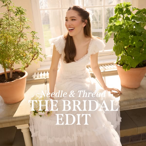 This image ad promotes Needle & Thread's Bridal Edit, featuring a woman in a white wedding dress smiling and sea