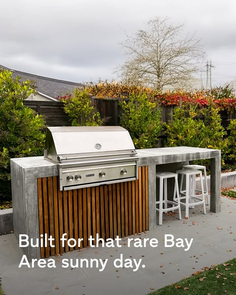 This ad showcases an outdoor grill and bar area built into a backyard space.