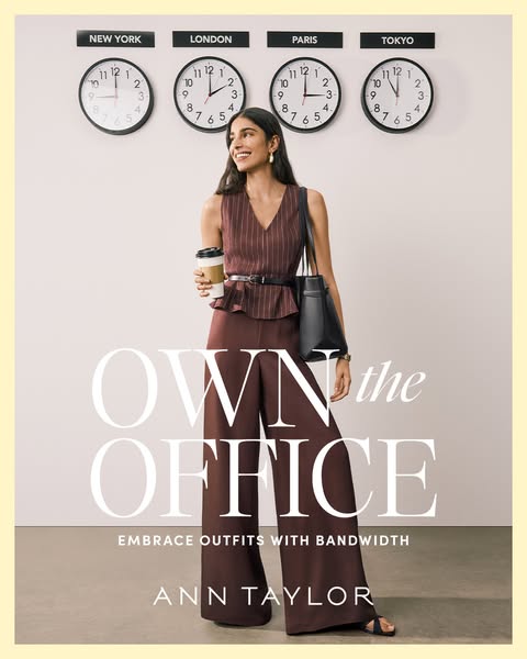 This image ad for Ann Taylor features a professional woman dressed in a maroon pantsuit in front of a wall with clocks r