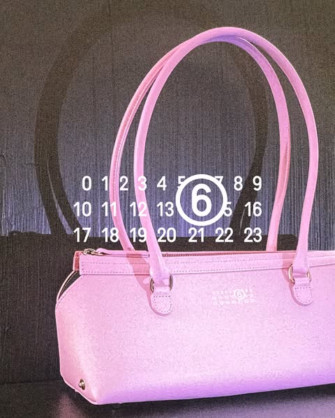 This ad showcases a pink handbag in front of a digital calendar. The number 6 is highlighted, implying that something is