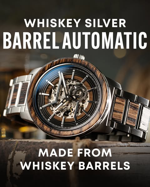 This ad features a close-up of a Whiskey Silver Barrel Automatic watch, highlighting its unique design and materials. Th