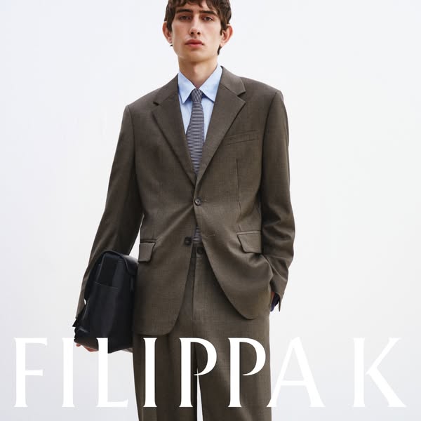 An advertisement for a men's suit from Filippa K.