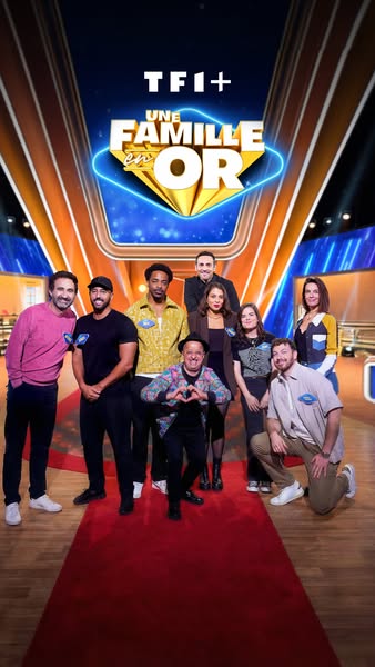 This is an ad for TF1+ show “Une Famille en Or”. It features 9 people from the show posing for a group photo. The show’s
