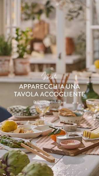 The ad features an inviting table setting with various artisanal dishes and tableware, promoting the brand's product