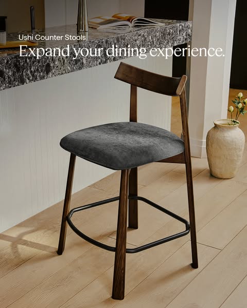 This ad showcases a wooden counter stool with a gray seat, highlighting its design and potential to enhance the dining e
