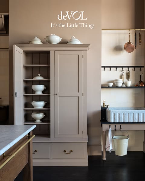 This ad features a kitchen cabinet and sink from deVOL, emphasizing the brand's attention to detail and quality craf