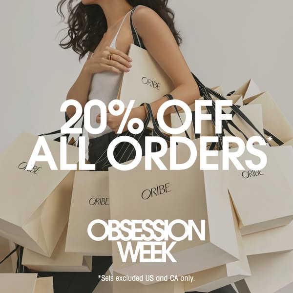 This ad for Oribe features a woman holding multiple shopping bags filled with Oribe products. The ad promotes a 20% off 