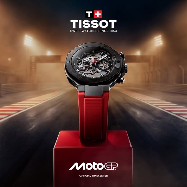 This ad features a Tissot watch prominently displayed against the backdrop of a racetrack, emphasizing the brand's a