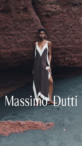 This ad features a static image of a woman in a brown and white dress. The image shows the brand's name at the botto