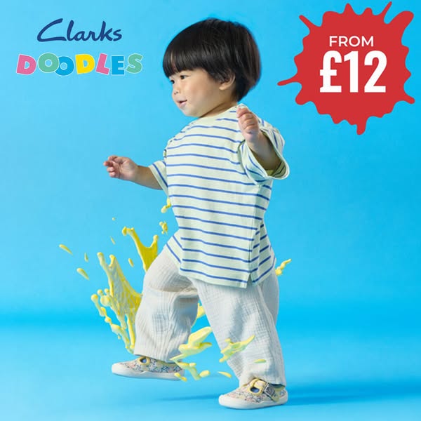 This ad features a toddler wearing Clarks Doodles shoes, stepping over a splash of yellow paint. The visual is set again