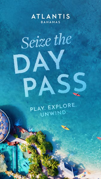 This image ad showcases Atlantis Bahamas and encourages viewers to seize the day with a day pass. An aerial view of the 