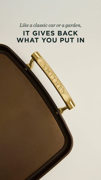 This ad showcases a Smithey cast iron pan and emphasizes the idea that the more you put into it, the more it gives back,