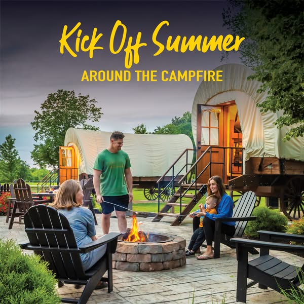 This image ad is advertising for a vacation or resort. It shows a family roasting marshmallows around a campfire in fron