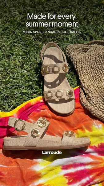 This ad showcases a pair of beige raffia sandals from Larroude, highlighting their suitability for summer. The sandals a