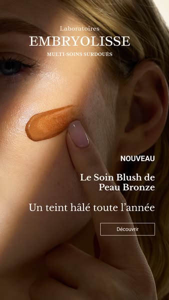 This ad features a close up of a woman's face with a bronze blush product. The ad highlights the product's abili