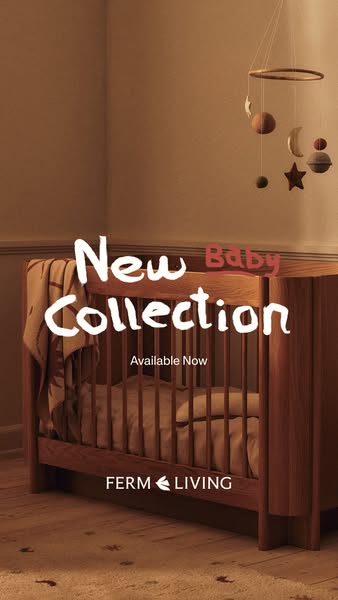 This ad promotes Ferm Living's new baby collection, featuring a wooden crib and a mobile.