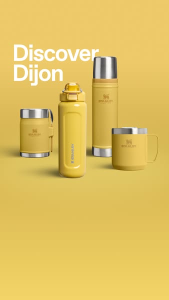 The ad features an array of mustard yellow Stanley-branded products on a yellow background to showcase their color '