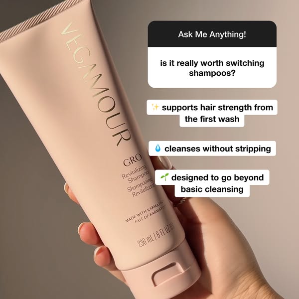 This ad is for Vegamour GRO Revitalizing Shampoo. The ad features a hand holding the shampoo tube with text callouts of 