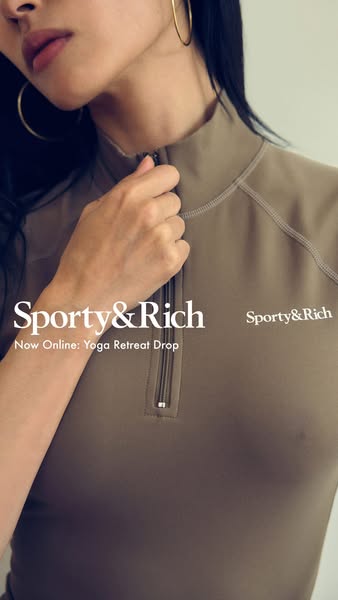 This ad showcases Sporty & Rich activewear by featuring a woman wearing a long-sleeved zip-up top from the brand'