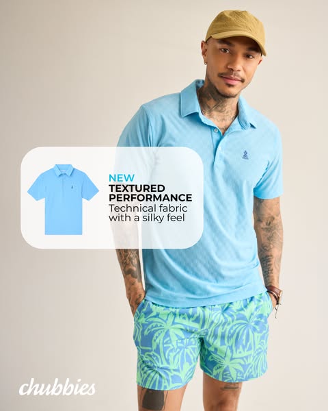 A fashionable man is shown wearing a polo shirt and shorts from Chubbies.