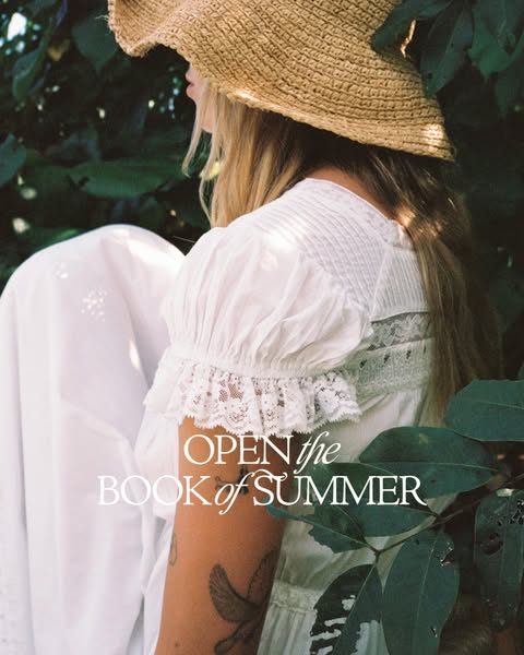 This ad shows a white dress and invites the viewer to ‘Open the Book of Summer’