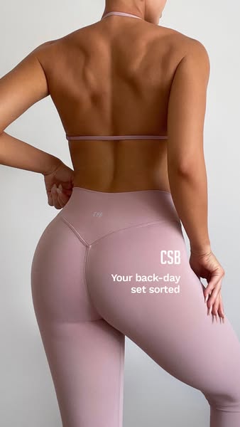 A still image ad showing an athletic woman wearing matching leggings and top from CSB. The text overlay reads “Your back